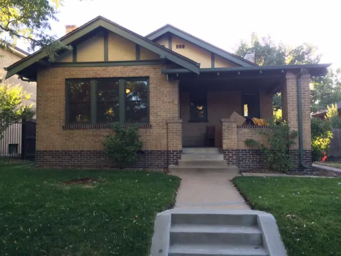Home Exterior View of Brick Wall House