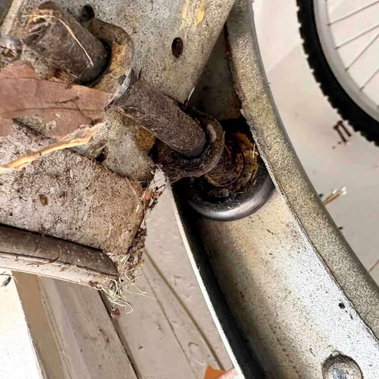 Corroded garage door rollers that stopped turning properly before replacement in Tulsa, OK