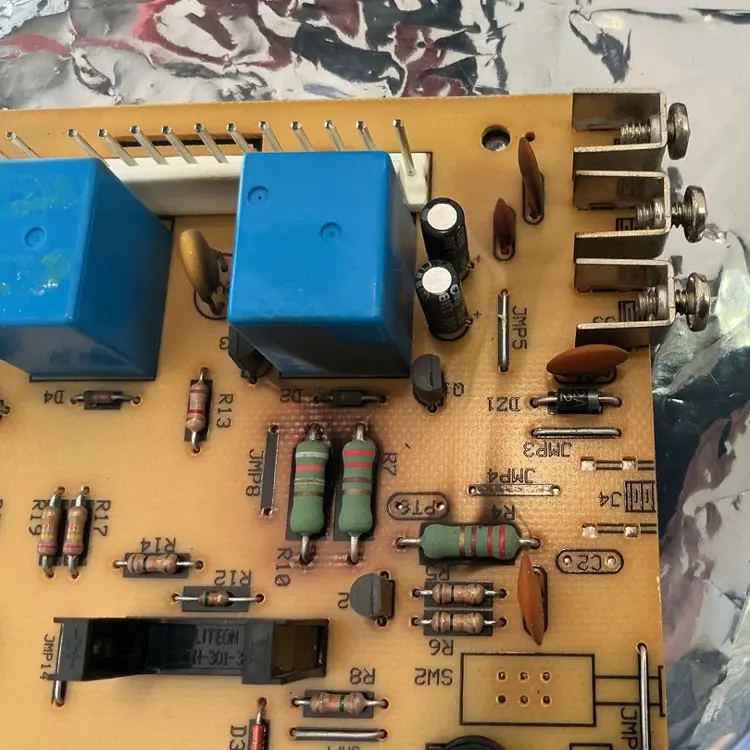 Garage door opener circuit board damaged by a power surge in Fort Worth, Texas.