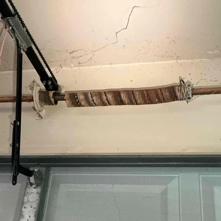 Failed single garage door torsion spring replaced at a Houston, TX home