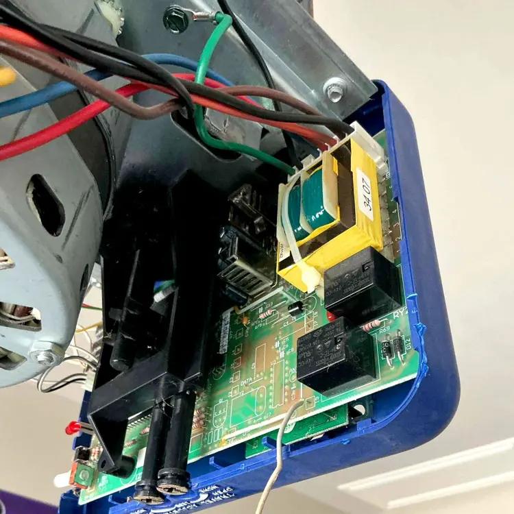 Deteriorated garage door opener circuit board repaired after an electrical short in San Antonio, TX