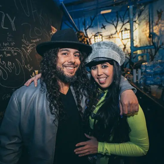 Leah Concialdi of TNERTLE and ATOMGA posing with Jordan Linit of Analog Son in the green room of the Bluebird Theater in Denver