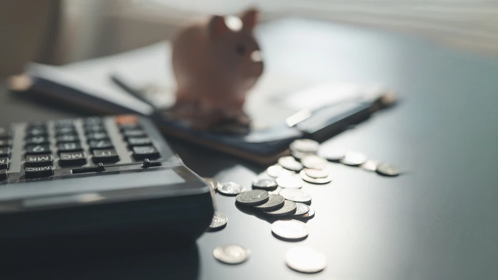 calculator and piggy bank