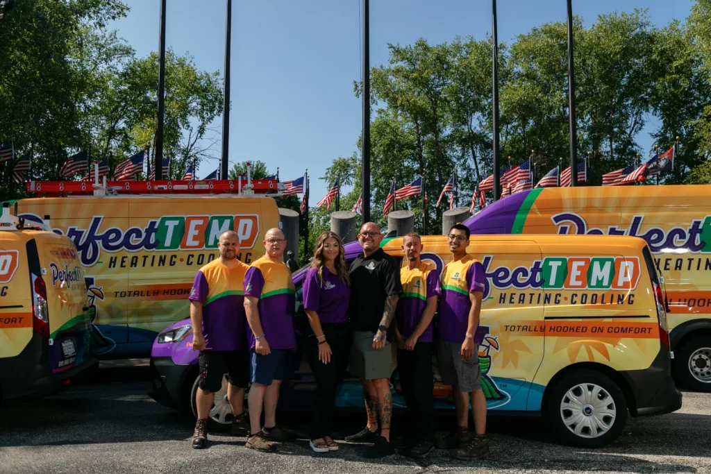 perfect temp team in front of company fleet