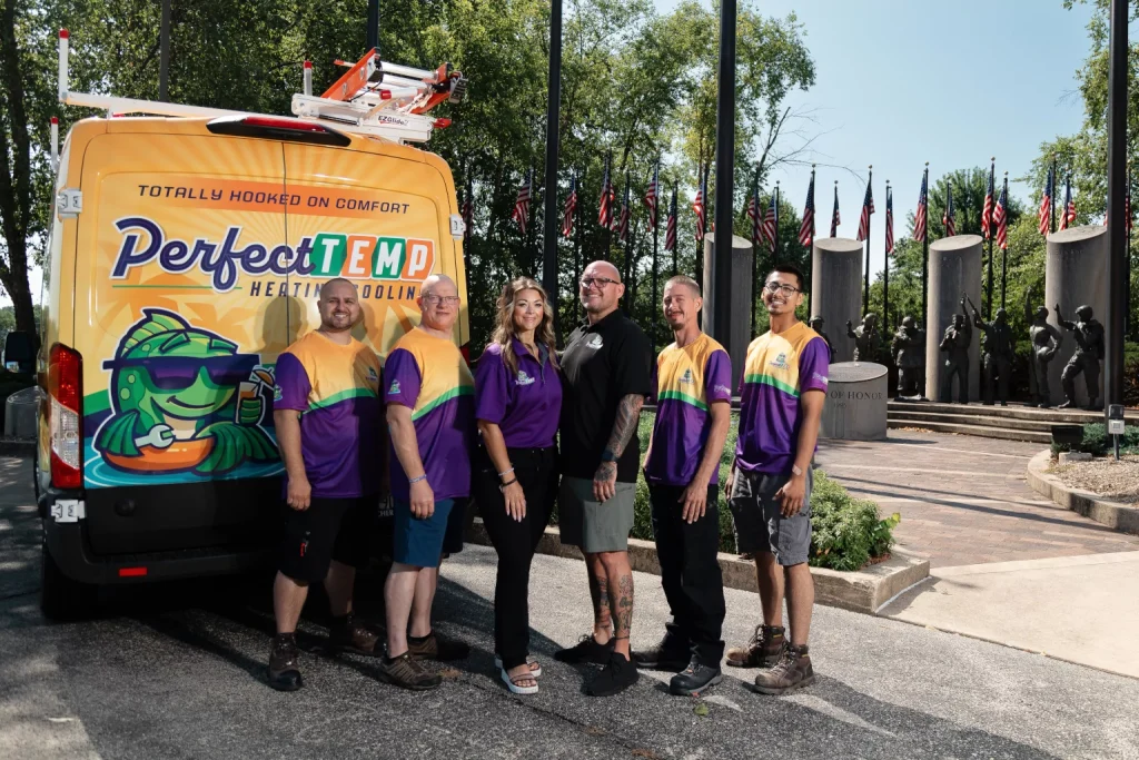 perfect temp team standing next to van