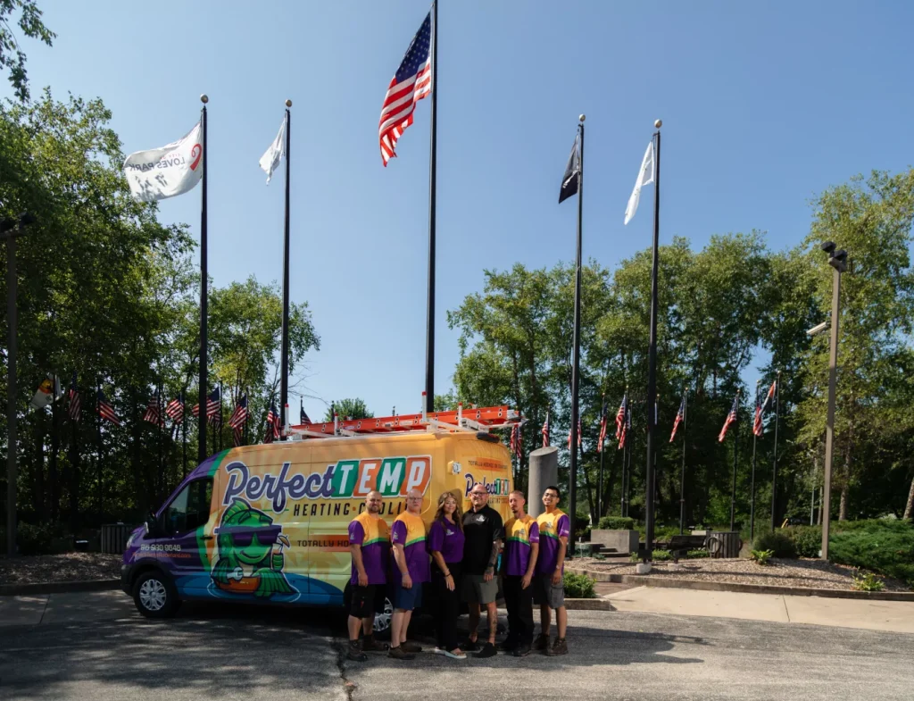 perfect temp van and team in front of american flag