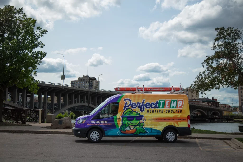 perfect temp van parked next to a bridge