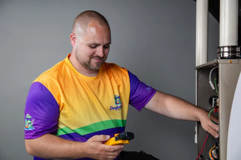 perfect temp worker measuring furnace electrical current