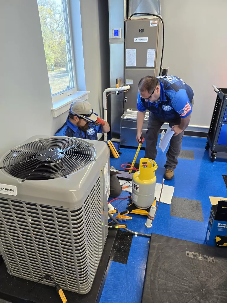 technician and heat pump