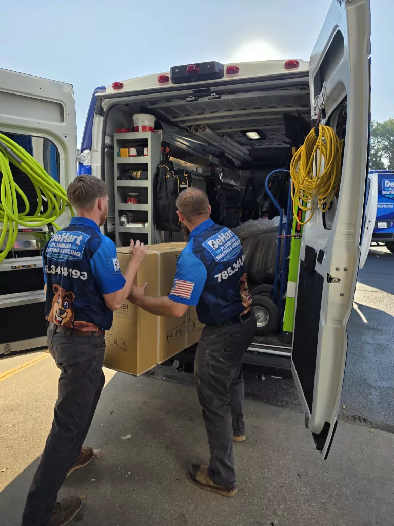 technicians unloading van