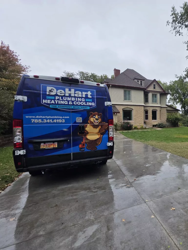van parked next to a house