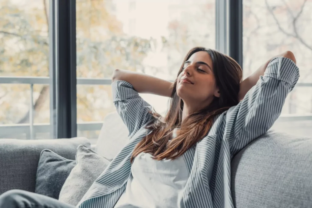 woman taking a deep breath