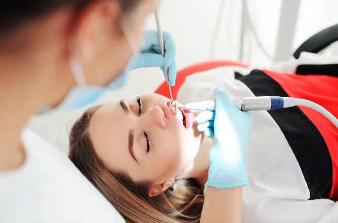 Dentist treating a patient with a dental emergency in Manhattan