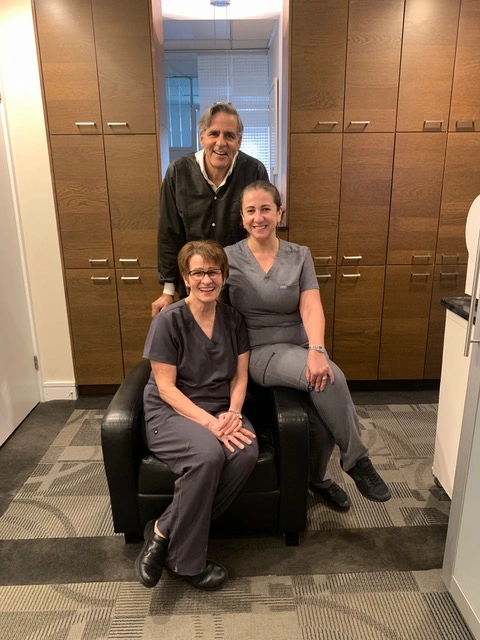 Dr. Marc J. Beshar with dental team in Manhattan
