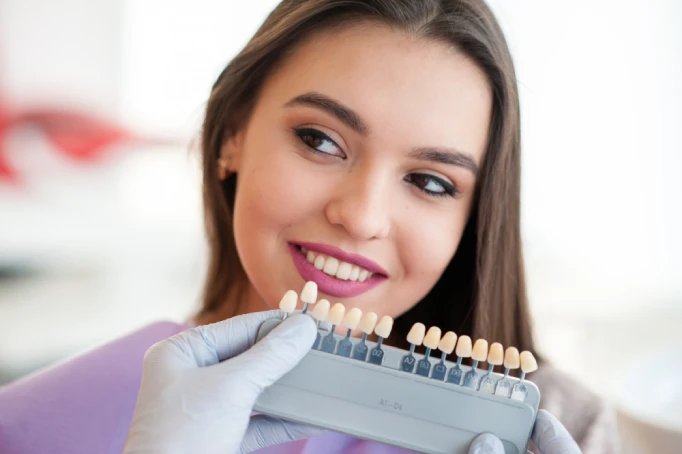 Porcelain veneers vs composite bonding comparison for a natural smile in Manhattan NYC