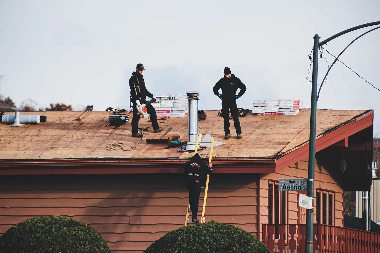 Men working on a roof.