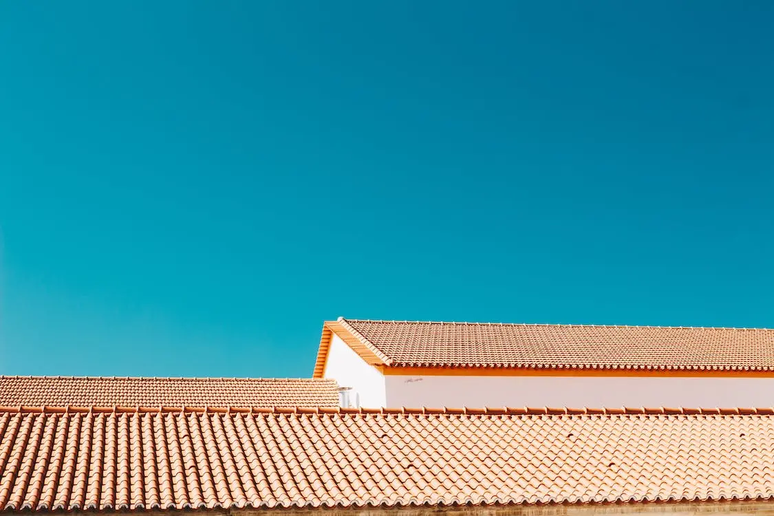 Blue sky and a clean roof.
