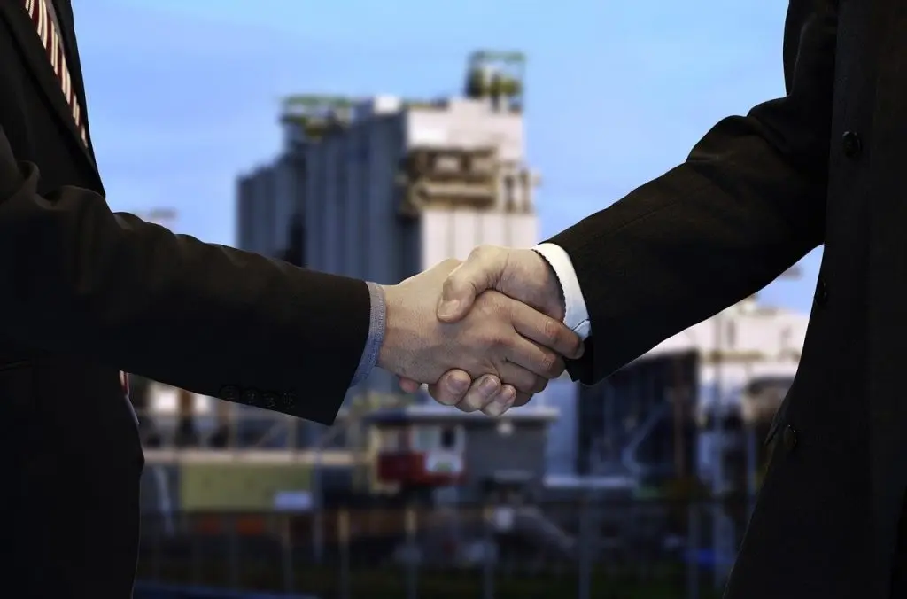 A handshake between two gentlemen.