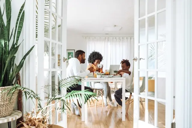 Picture of a family in their home.