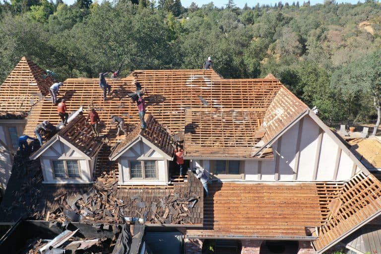 roofing team replacing roof