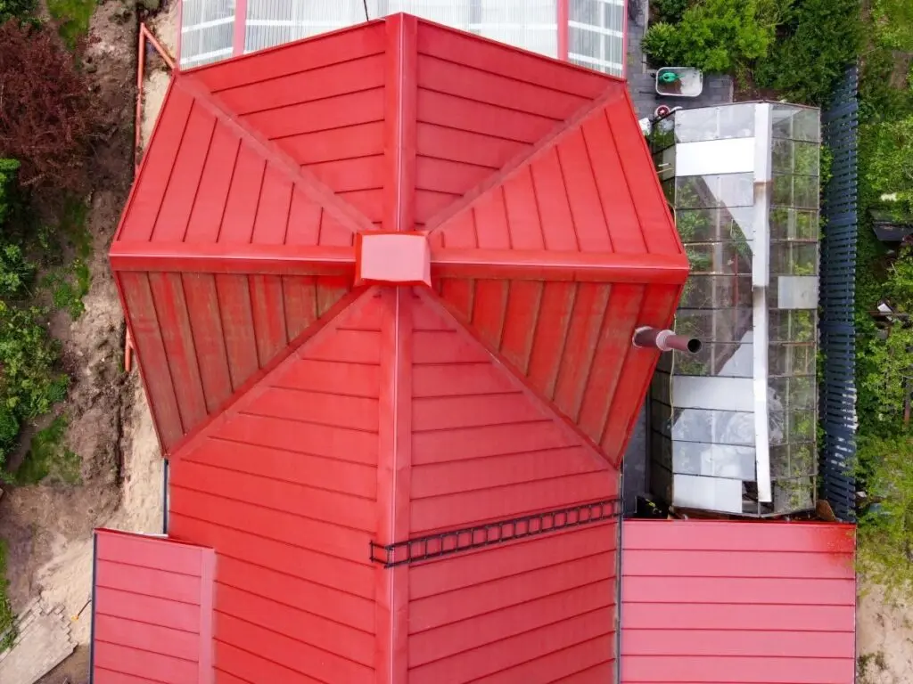 metal-standing-seam-roof-aerial-view-classical-red-roof-e1783608652231