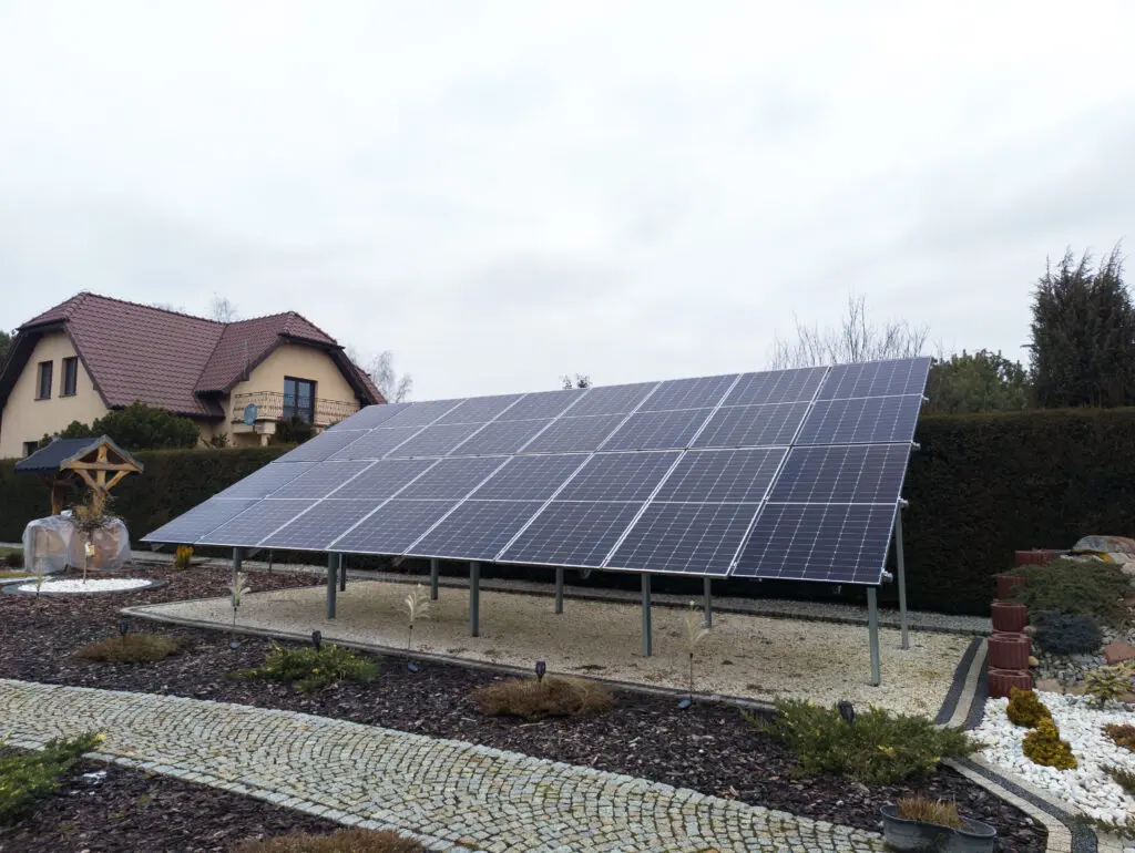 Ground mounted solar panels on landscaped residential land