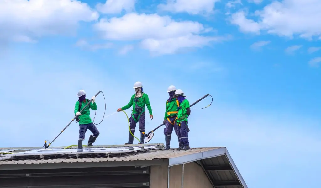 team cleaning roof solar panel cleaning 
