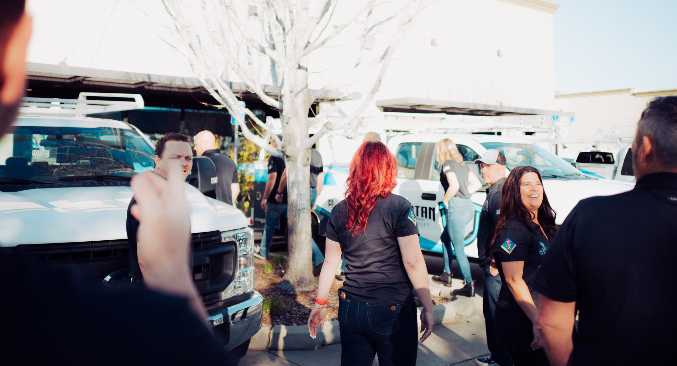 spartan-team-talking-in-parking-lot