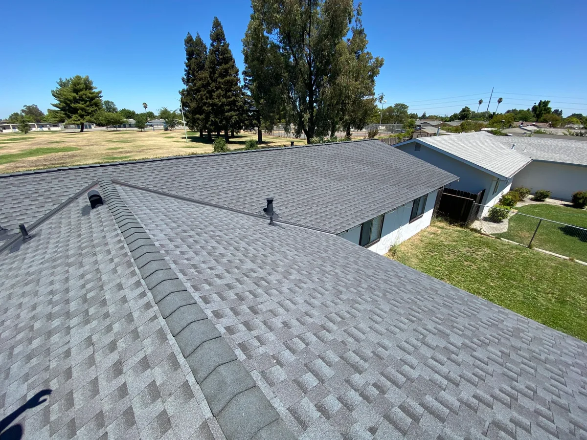 Close-up of a newly installed grey shingle roof
