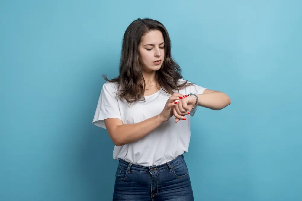 How Long Does an AC Repair Typically Take? - Young woman looking at her wrist watch