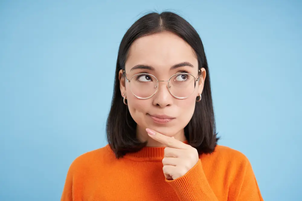 Why Should You Replace Your Old AC System With a Ductless Mini Split - woman thinking