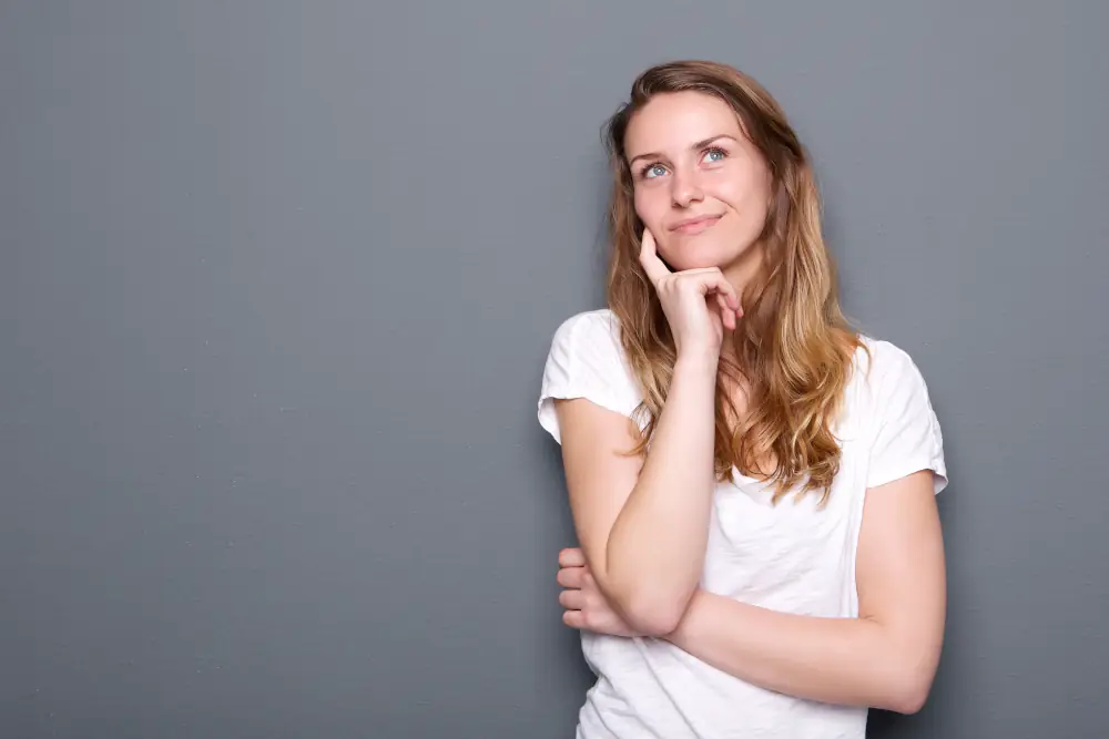 White Settlement’s Choice: Heat Pumps or Furnace - Young woman thinking.