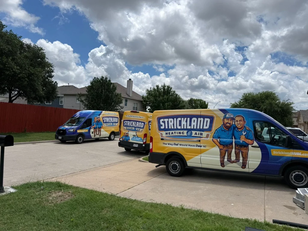 Strickland vans parked in a residential area