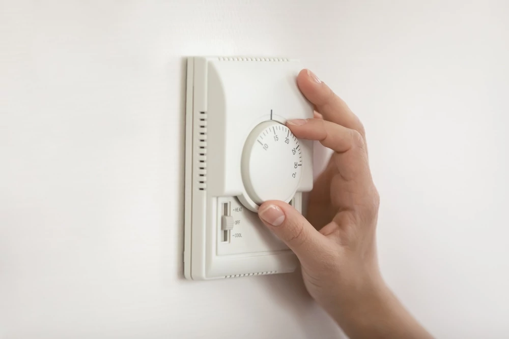 Old fashioned thermostat adjustment