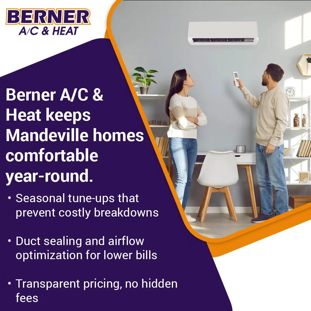 Homeowners adjusting indoor air conditioning unit for year-round comfort in Mandeville Louisiana home
