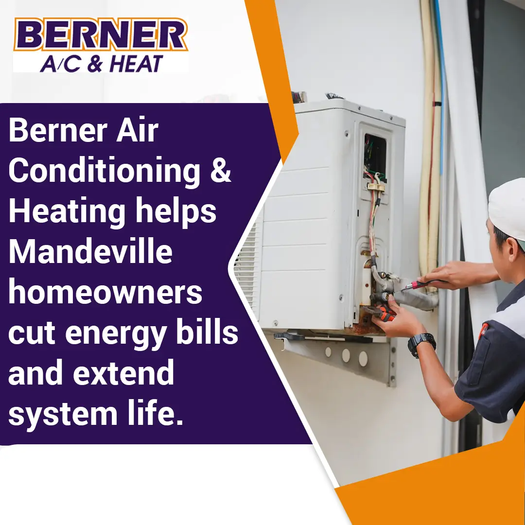 HVAC technician repairing wall-mounted air conditioning unit to improve efficiency and lower energy bills