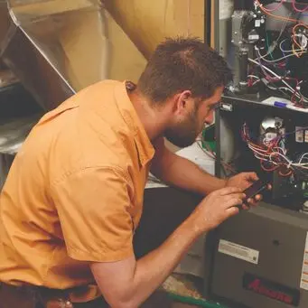 Amana furnace service and maintenance performed by Berner A/C & Heat technician