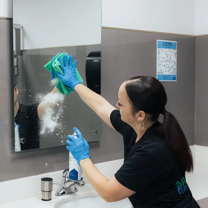 a Boca Raton janitor cleaning an office or facility restroom