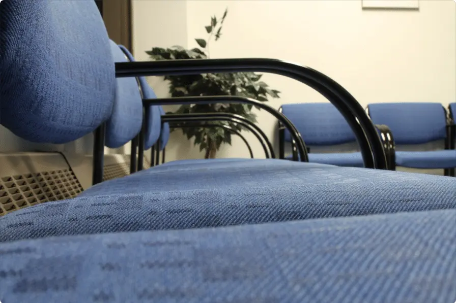 Office chairs lined up neatly in a row at Sawgrass Cleaning Solutions, specializing in Upholstery Cleaning