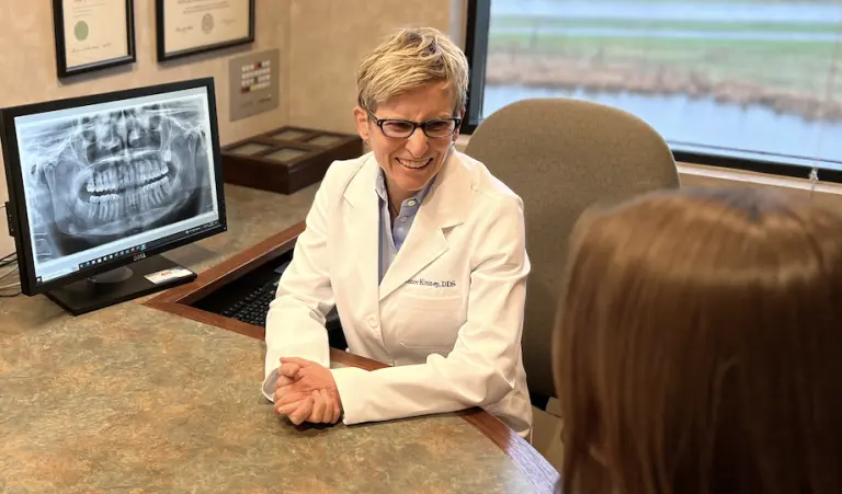 Dr. Renee Kinney patient oral health consultation-Art & Science Family Dentistry Woodbury MN