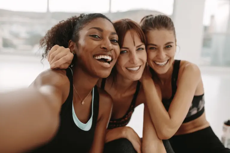 3-fitness-women-smiling-smile-month-Art-Science-Family-Dentistry-Woodbury-MN