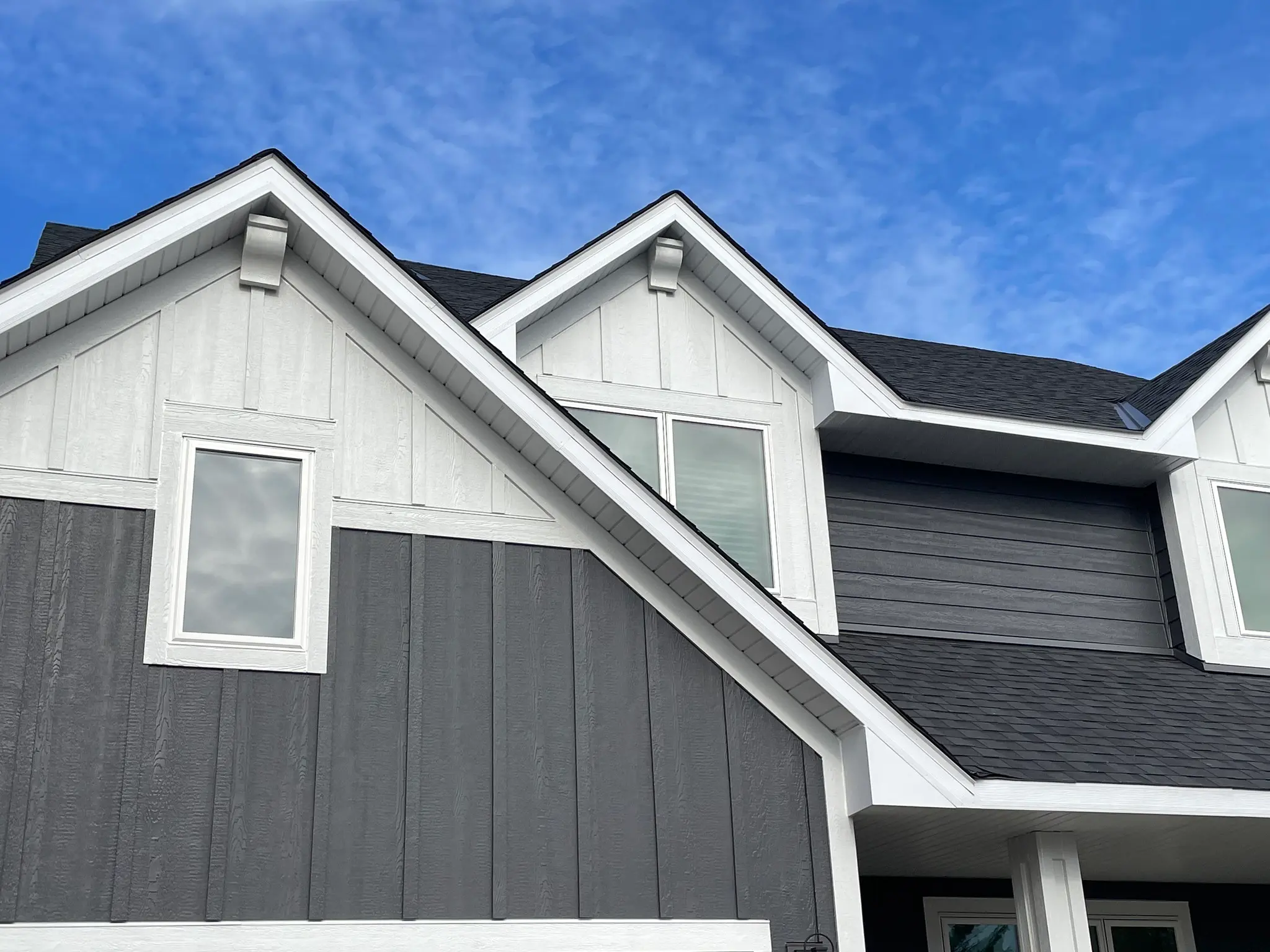 A house with grey and white siding