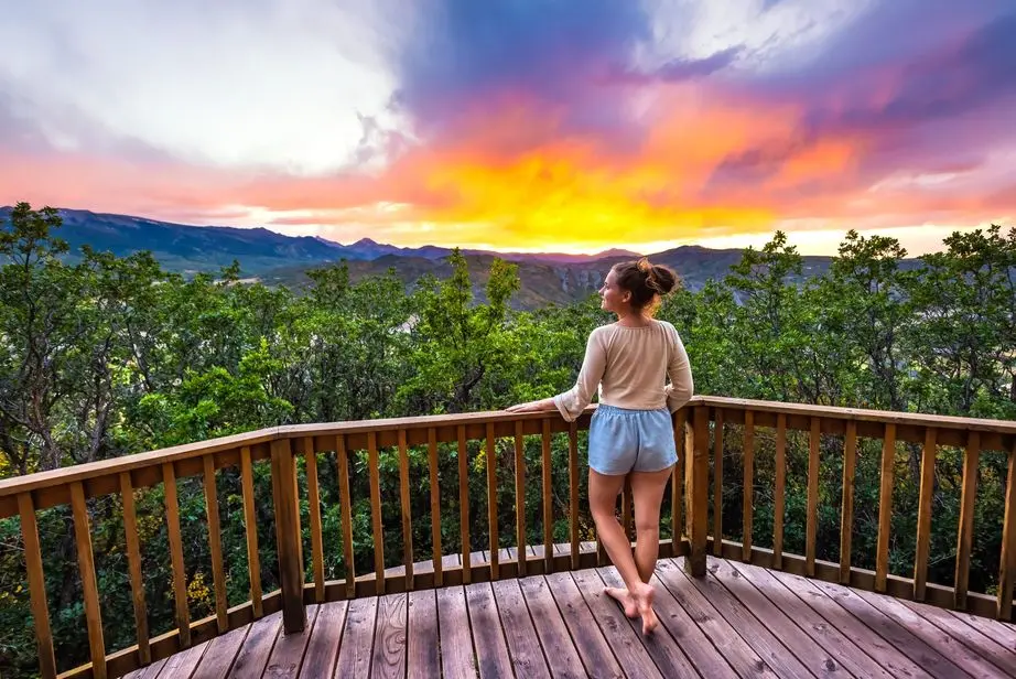 a woman at a viewing deck