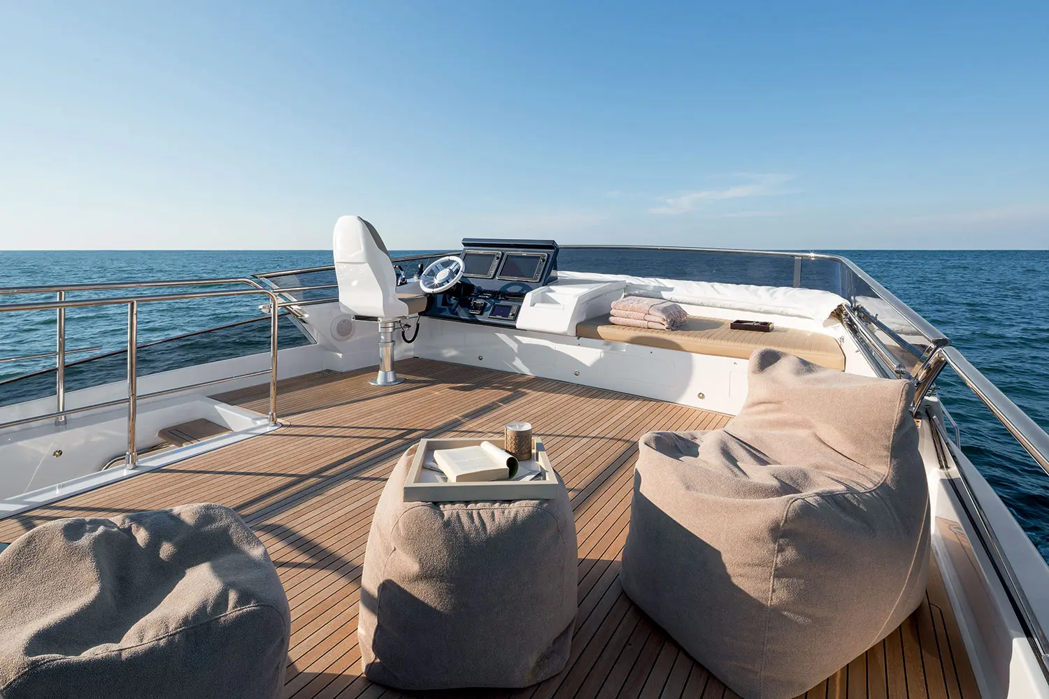 Azimut 77S sport-fly sundeck with helm and sunpads — shipyard photo