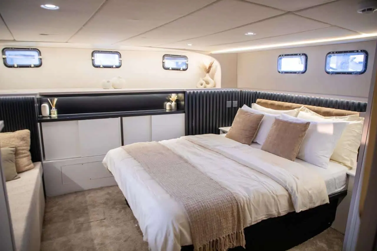 Master bedroom cabin aboard Zenith 64 luxury yacht