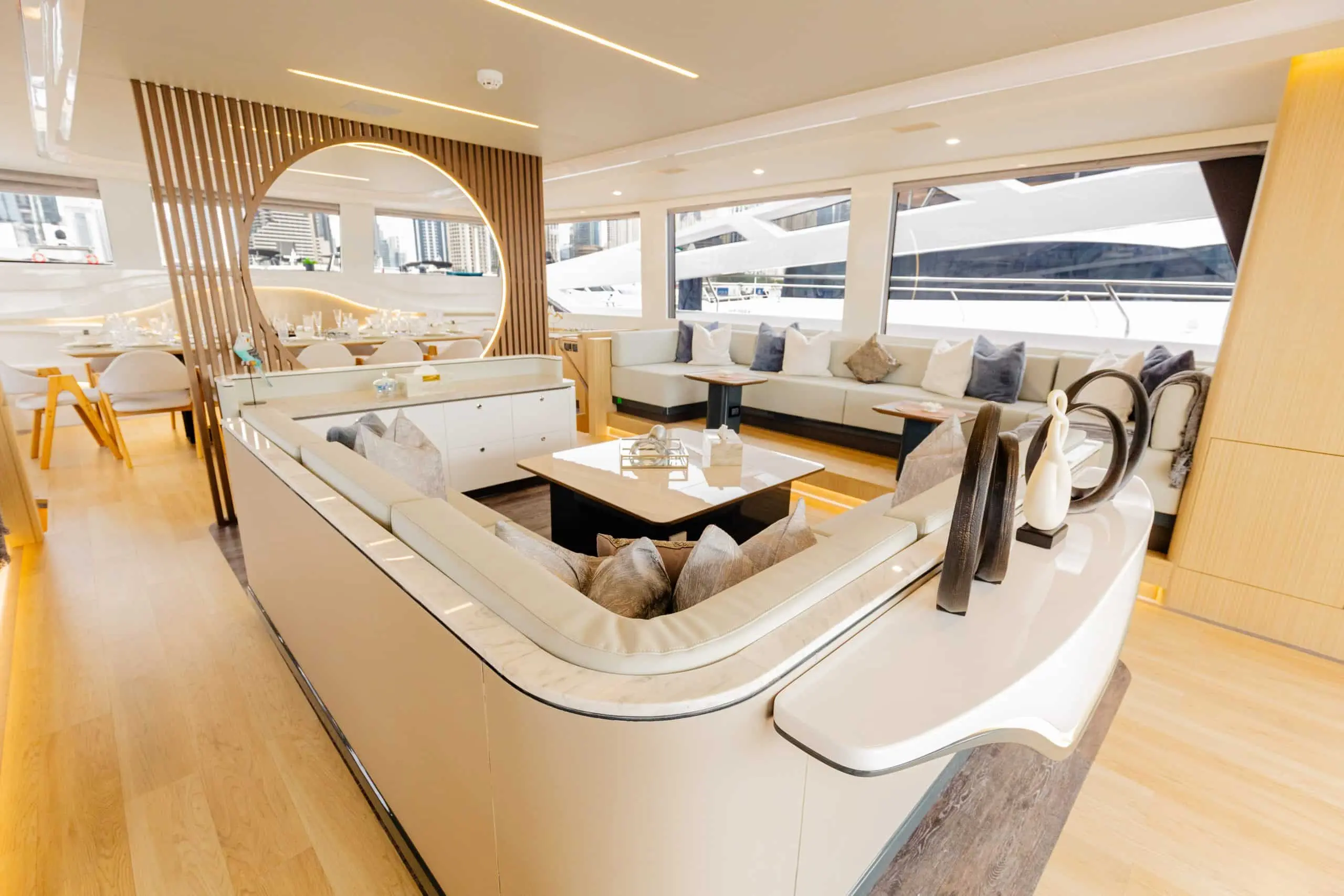 Modern interior of Zirve 72 yacht showing open-plan saloon with sea view windows