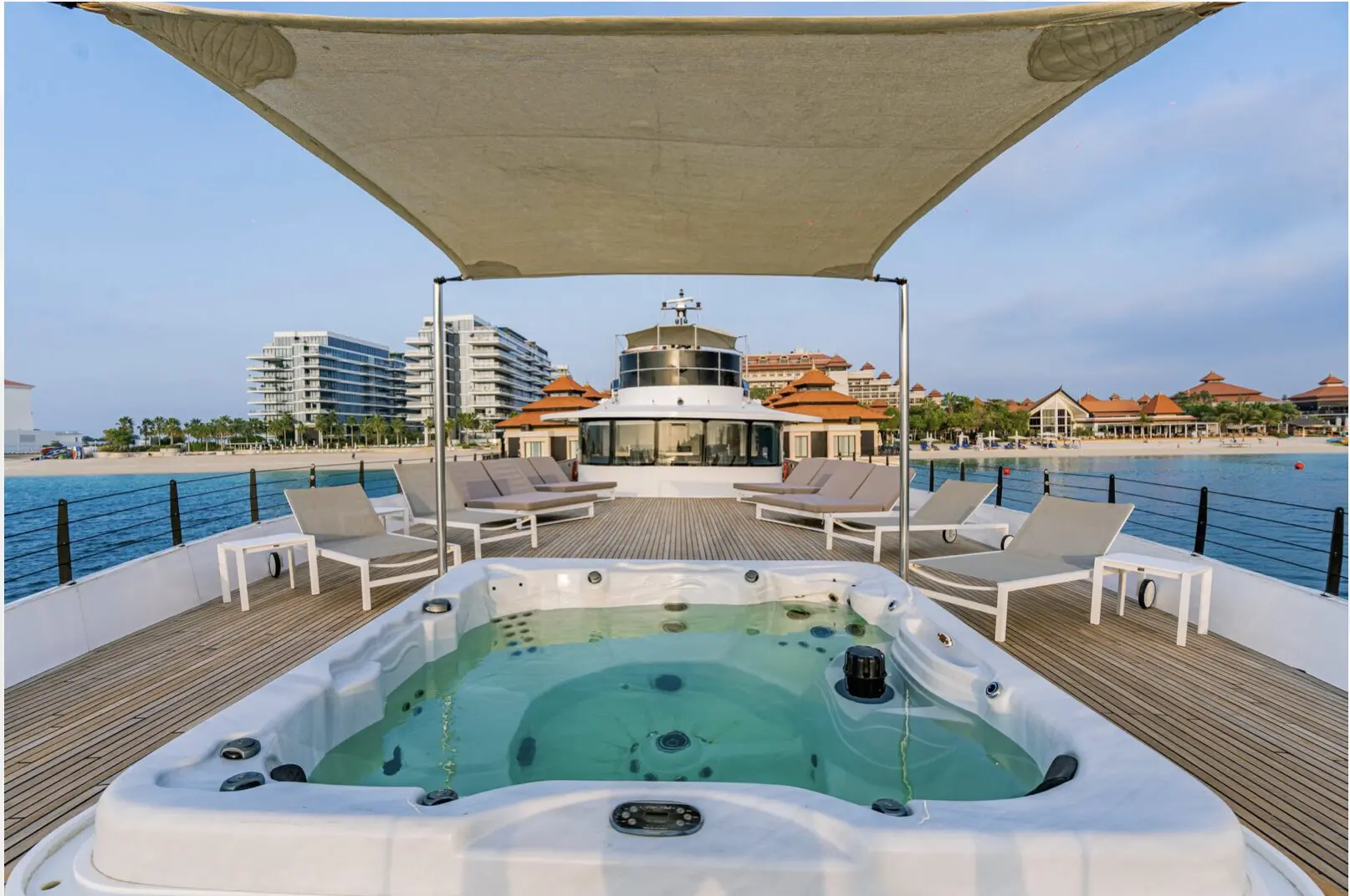 Finesse yacht jacuzzi on upper deck with Dubai skyline view