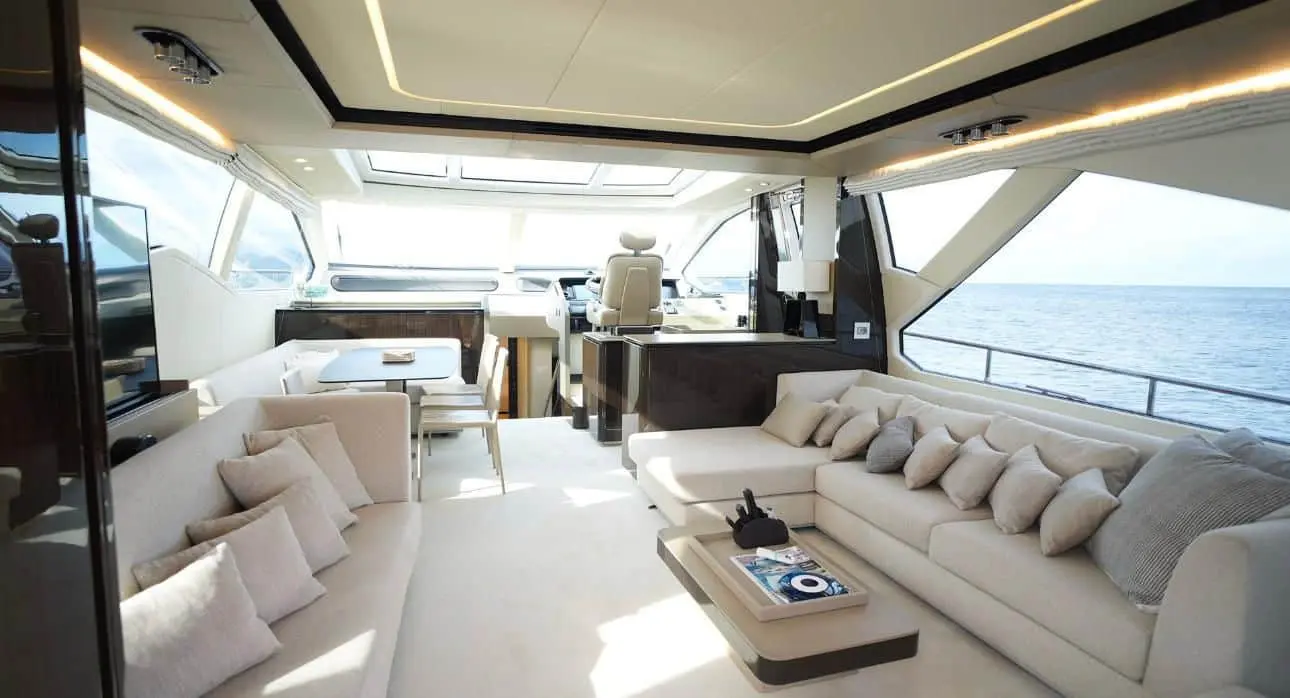 Azimut 77 yacht luxury lounge seating with panoramic side windows and sea views