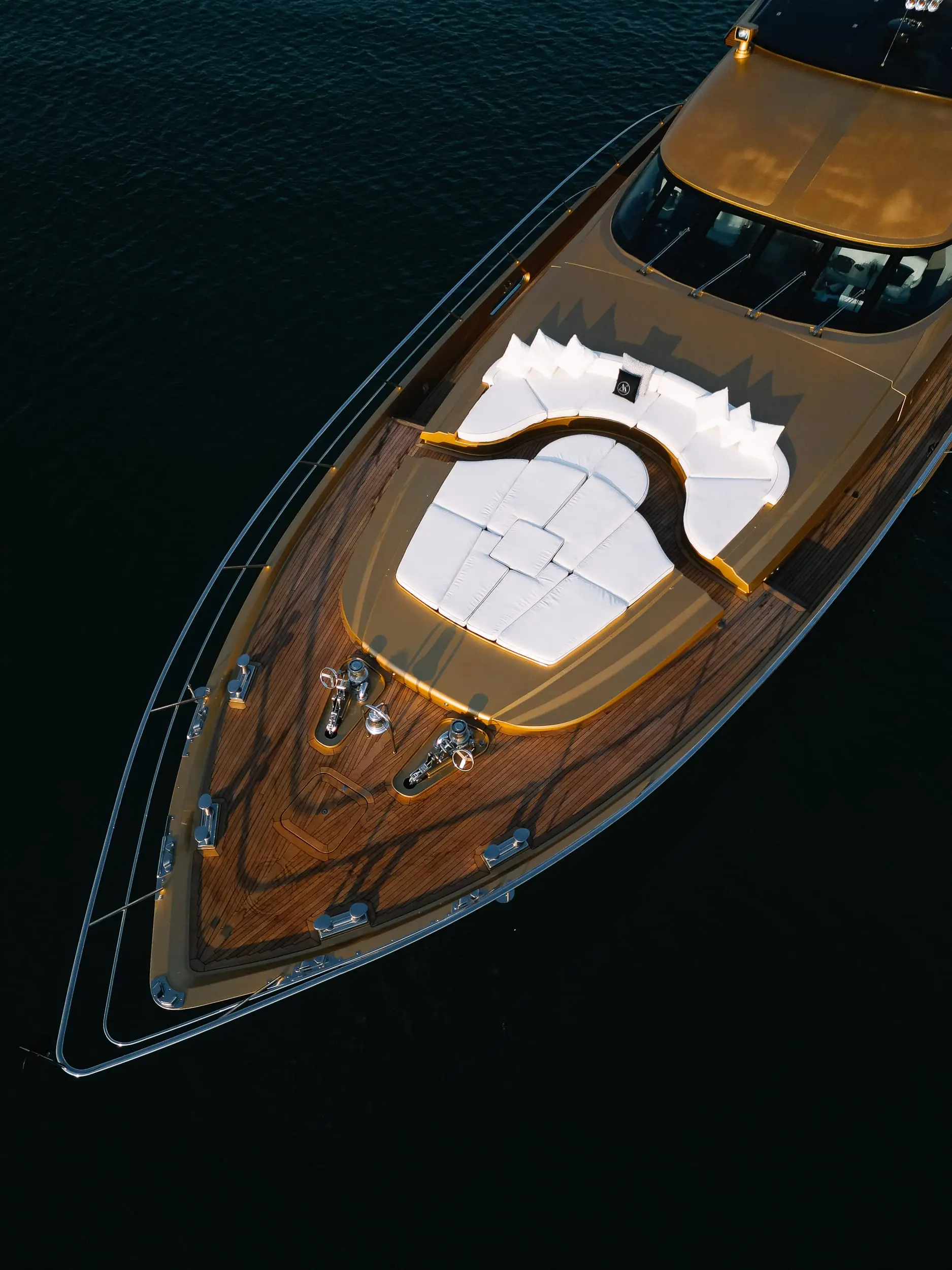 Top view of Royalty 136 luxury yacht illuminated at night