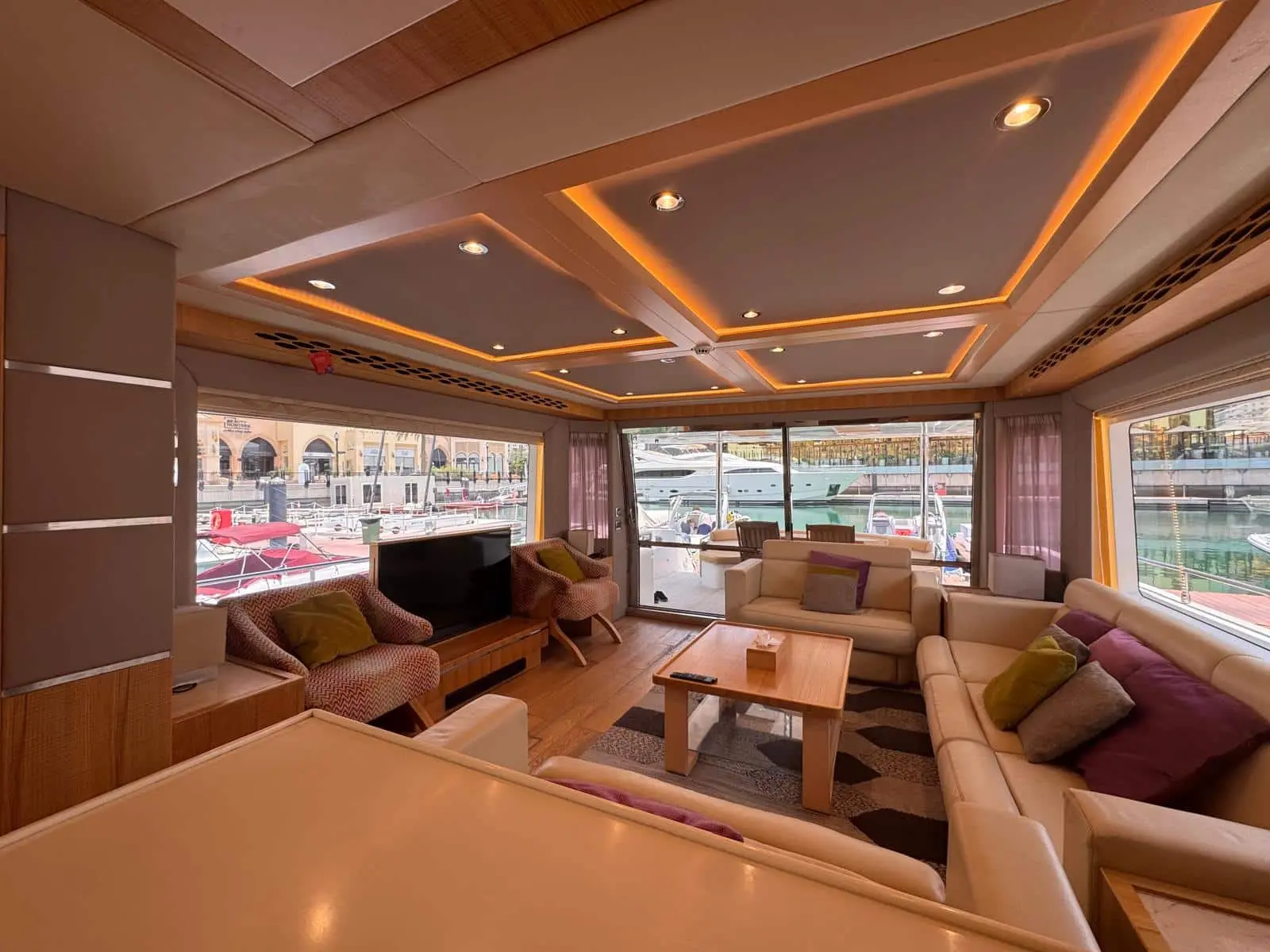 Nomad 65 saloon with aft views over The Pearl-Qatar marina
